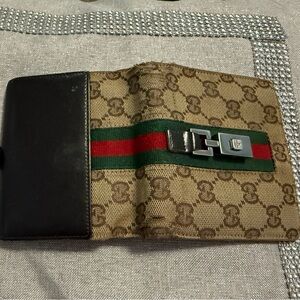 Gucci bifold wallet with lock